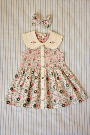 Top with American armholes and bow barrette